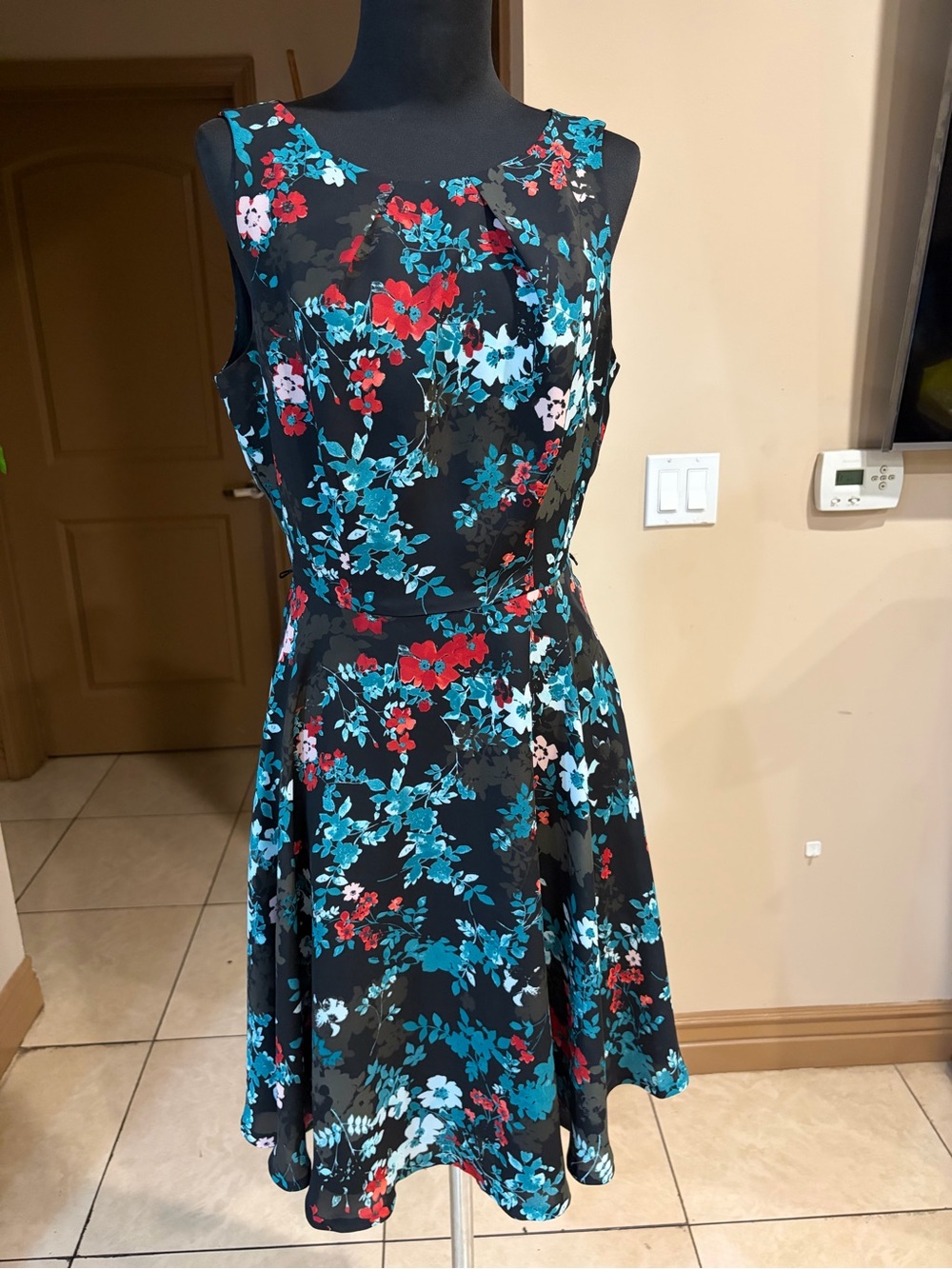 Elle Black Sleeveless Floral Mini Dress with Teal & Red Accents